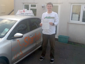 George with his Practical Driving Test Pass Certificate somewhere in Weston-super-mare