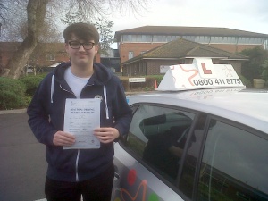 Pete with his Driving Test Pass Certificate outside Weston-super-Mare Driving Test Centre