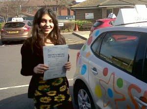 Athina with her Practical Driving Test Pass Certificate outside Weston-super-Mare Driving Test Centre.