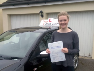 Katie with her Practical Driving Test Pass Certificate.